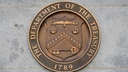 FILE PHOTO: Signage is seen at the United States Department of the Treasury headquarters in Washington, D.C.