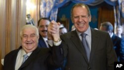 Valid al-Moalem (levo) sa Sergejom Lavrovom pre današnjih razgovora u Moskvi 