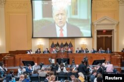 A video of former U.S. President Donald Trump from his January 6th Rose Garden statement is played as Cassidy Hutchinson, who was an aide to former White House Chief of Staff Mark Meadows during the Trump administration, testifies during House Select Committee a public hearing to investigate the January 6 Attack on the U.S. Capitol, at the Capitol, in Washington, U.S., June 28, 2022. (Shawn Thew/Pool via REUTERS)