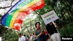 Parade Hari Kebebasan Gay di Bangkok, Thailand, 29 November 2018. Kabinet Thailand pada Selasa (21/11) menyetujui amandemen hukum perdata yang mengizinkan pernikahan sesama jenis. (Foto: Reuters)