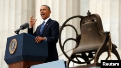 U.S. President Barack Obama speaks from the steps of the Lincoln Memorial during the commemoration of the 50th anniversary of the March on Washington August 28, 2013.