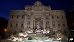 The newly restored Trevi Fountain is lit during the official inauguration in Rome, Italy, Nov. 3, 2015. 
