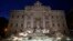 The newly restored Trevi Fountain is lit during the official inauguration in Rome, Italy, Nov. 3, 2015. 