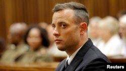 FILE - Former Paralympian Oscar Pistorius appears for sentencing for the murder of Reeva Steenkamp at the Pretoria High Court, South Africa, June 14, 2016.