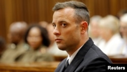 FILE - Former Paralympian Oscar Pistorius appears for sentencing for the murder of Reeva Steenkamp at the Pretoria High Court, South Africa, June 14, 2016.