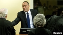 FILE - Kosovo's former prime minister, Ramush Haradinaj, is seen at his retrial at the International Criminal Tribunal for the former Yugoslavia in The Hague, Nov. 29, 2012.