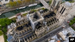 An image made available by Gigarama.ru on Wednesday April 17, 2019 shows an aerial shot of the fire damage to Notre Dame cathedral in Paris on Tuesday April 16.