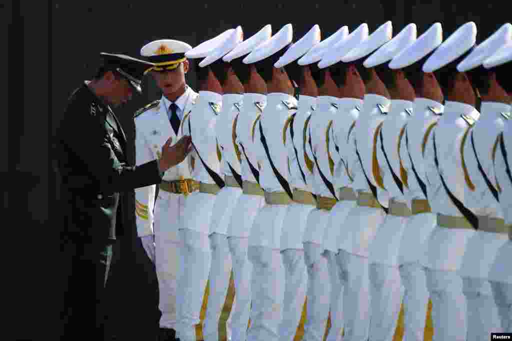 Chinese troops take part in marching drills ahead of an Oct. 1 military parade to celebrate the 70th anniversary of the founding of the People&#39;s Republic of China at a camp on the outskirts of Beijing.