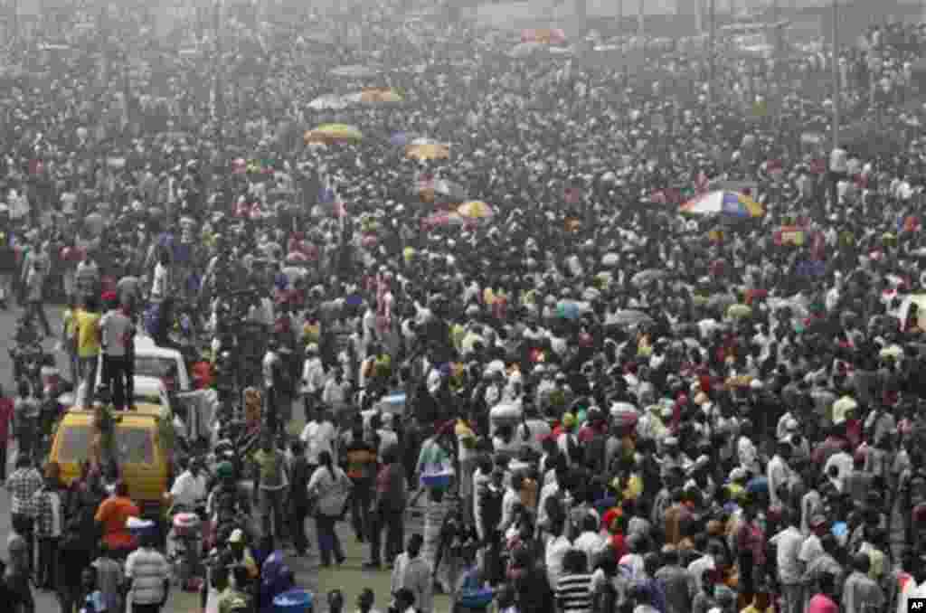 Protesters on day five of the nationwide strike following the removal of a fuel subsidy by the government, in Lagos, Nigeria, Friday, Jan. 13, 2012. Unions in Nigeria announced Friday a weekend pause in a paralyzing national strike amid new negotiations w