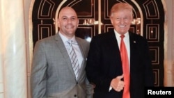 FILE - U.S. businessman David Correia appears to pose with President Donald Trump in an undated screen capture from Correia's Facebook account made by investigators and provided to Reuters, Oct. 10, 2019.