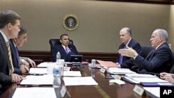 President Barack Obama is briefed by members of his national security team in the Situation Room of the White House, in Oct 2010 (file photo)