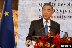 FILE - Chinese Foreign Minister Wang Yi speaks at an event marking the inauguration of the new Belgian embassy in Beijing, China January 11, 2024.