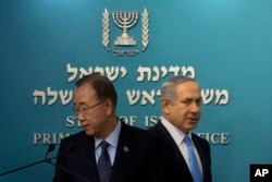United Nations Secretary-General Ban Ki-moon, left, and Israeli Prime Minister Benjamin Netanyahu, arrive to a press conference at the Prime Minister’s office in Jerusalem, Oct. 20, 2015.