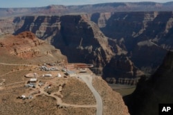 A view of the Hualapai Indian Reservation from the Grand Canyon West, Ariz. Many tribes are located on rural reservations, remote from polling places, which discourages members from voting in local, state and national elections.