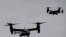 FILE - US Marine Corps V-22 Osprey aircraft approach for landing in New York, Sept. 25, 2014.
