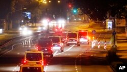  Police cars drive on an almost deserted street during an evacuation of more than 60 000 people in Frankfurt, Germany, Sept. 3, 2017. The evacuation became necessary because of an unexploded 1.8 ton WW II bomb that will be diffused later in the day. 