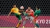 FILE — A picture showing South African goalkeeper Ronwen Williams in posts while his defender Luke Fleurs fights for the ball against Mexico's Henry Martin, during a match at the 2020 Summer Olympics, on July 28, 2021, in Sapporo, Japan.