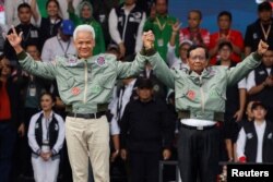 Calon presiden Ganjar Pranowo dan calon wakil presiden Mahfud MD menghadiri kampanya akbar di Semarang, Jawa Tengah, Sabtu, 10 Februari 2024. (Foto: Willy Kurniawan/Reuters)