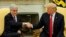 U.S. President Donald Trump, right, shakes hands with Chilean President Sebastian Pinera in the Oval Office of the White House in Washington, Sept. 28, 2018. 