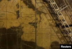 Part of a map showing the central Mediterranean is seen in the map room at the Combined Operations Center, dating back to World War II, in the War Headquarters tunnels beneath Valletta, Malta, March 24, 2017.