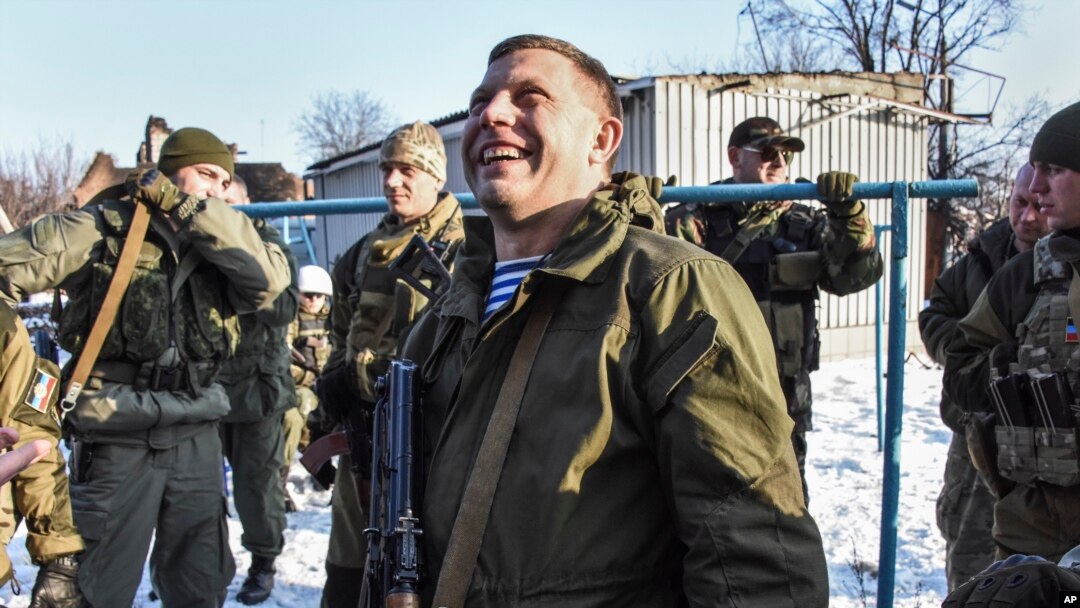 Pro-Russian rebel leader Alexander Zakharchenko, center, surrounded by guards, Jan. 15, 2015.