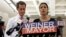 New York mayoral candidate Anthony Weiner, left, listens as his wife, Huma Abedin, speaks during a news conference at the Gay Men's Health Crisis headquarters, July 23, 2013, in New York. 
