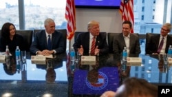 President-elect Donald Trump speaks during a meeting with technology industry leaders at Trump Tower in New York, Dec. 14, 2016. From left are, Facebook COO Sheryl Sandberg, Vice President-elect Mike Pence, Trump, PayPal founder Peter Thiel, and Apple CE