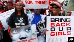 Women attend a demonstration calling on government to rescue kidnapped school girls of a government secondary school Chibok, in Lagos, Nigeria, May. 5, 2014.