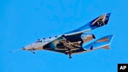 Virgin Galactic reaches space for the first time during its 4th powered flight from Mojave, Calif. 