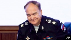 FILE - Russian Deputy Defense Minister Anatoly Antonov smiles at a briefing in the Defense Ministry in Moscow, Russia. 