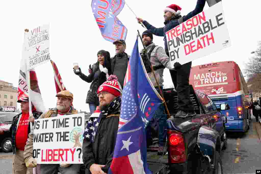 People attend a rally at Freedom Plaza Jan. 5, 2021, in Washington, in support of President Donald Trump. 