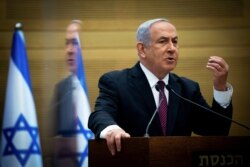 FILE - Israeli Prime Minister Benjamin Netanyahu delivers a statement to Likud party MKs at the Knesset (Israel's parliament) in Jerusalem, Dec. 2, 2020.