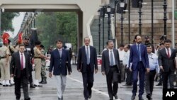 Indian officials from Ministry for External Affairs arrive after crossing the border for a meeting with Pakistani officials at Wagah border, near Lahore, Pakistan, July 14, 2019.
