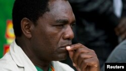 FILE - United Party for National Development (UPND) Presidential candidate Hakainde Hichilema looks on during a rally in Lusaka, Jan. 18, 2015