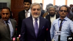 Abdullah Abdullah who is to become Afghanistan's chief executive arrives to speak to his supporters in Kabul, Afghanistan, Sept. 25, 2014. 