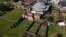 FILE - An aerial view shows Glyndebourne Opera House and surrounding gardens in Lewes, Britain March 9, 2021. (REUTERS/Gerhard Mey)