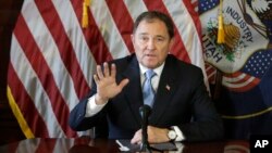 FILE - Utah Gov. Gary Herbert speaks to reporters during a news conference at the Utah State Capitol, in Salt Lake City, Feb. 5, 2015.