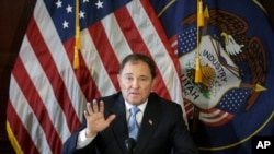 FILE - Utah Gov. Gary Herbert speaks to reporters during a news conference at the Utah State Capitol, in Salt Lake City, Feb. 5, 2015.