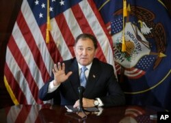 FILE - Utah Gov. Gary Herbert speaks at the Utah State Capitol in Salt Lake City, February 5, 2015. Herbert has ordered an investigation into an $800,000 no-bid contract with a company that had been promoting drugs to treat COVID-19 patients.