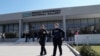 Greek police officers walk outside the National Gallery, as Nikolaos Papadopoulos, member of parliament of the small right-wing Niki party, has detained after he allegedly attacked art works being hosted at an exhibition, in Athens, March 10, 2025.