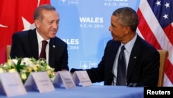 FILE - U.S. President Barack Obama hosts a bilateral meeting with Turkey's President Tayyip Erdogan during the NATO Summit in Newport, Wales, Sept. 2014.