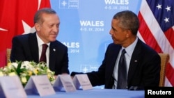 Geçen ay Galler'deki NATO zirvesi sırasında bir araya gelen Cumhurbaşkanı Recep Tayyip Erdoğan ve Başkan Barack Obama