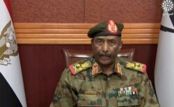 FILE - In this frame taken from video, the head of the military, Gen. Abdel-Fattah Burhan, is seen during a televised address, in Khartoum, Sudan, Oct. 25, 2021.