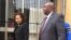 Saviour Kasukuwere outside a Zimbabwean court