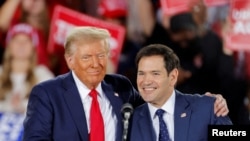 Presidente dos EUA, Donald Trump, e o secretário de Estado, Marco Rubio Foto de Arquivo