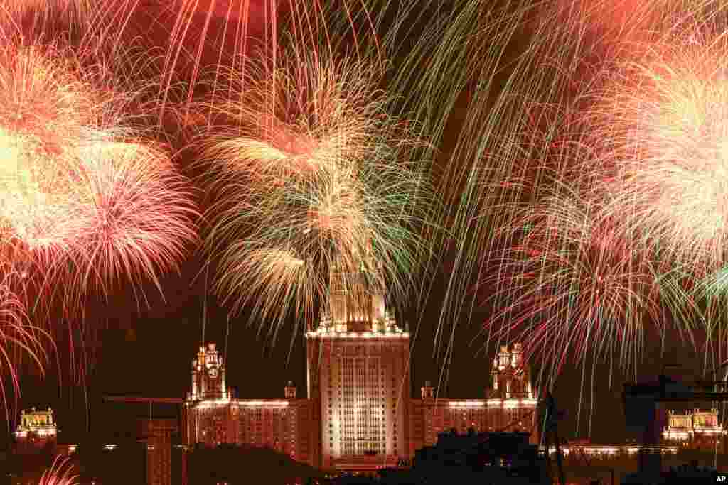 Fireworks explode over Moscow State University during the celebration of the 75th anniversary of the Nazi defeat in World War II in Moscow, Russia, May 9, 2020.