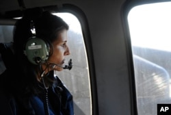 From a helicopter, Gov. Nikki Haley checks flooding caused by Hurricane Matthew near Mullins, South Carolina, Oct.10, 2016.