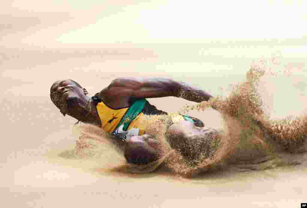 September 1: Damar Forbes of Jamaica competes in the men's long jump qualifying event at the IAAF World Championships in Daegu. REUTERS/Max Rossi