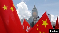 资料照：中国国旗与香港旗帜