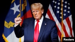 FILE PHOTO: Former U.S. President Donald Trump at the North Carolina GOP convention dinner in Greenville